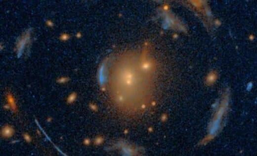 Largest Ever Einstein Cross Found In Rare Carousel Of Galaxies, Revealing Dark Matter Clues